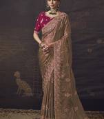 Peach party wear self jecquard saree with designer blouse fabric