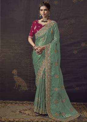 Sea green party wear self jecquard saree with designer blouse fabric 1