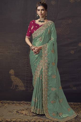 Sea green party wear self jecquard saree with designer blouse fabric