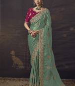 Sea green party wear self jecquard saree with designer blouse fabric