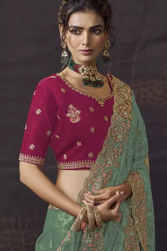 Sea green party wear self jecquard saree with designer blouse fabric