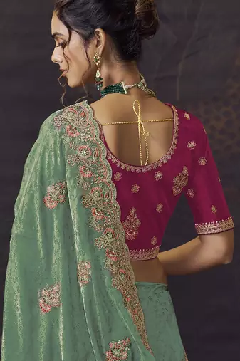 Sea green party wear self jecquard saree with designer blouse fabric