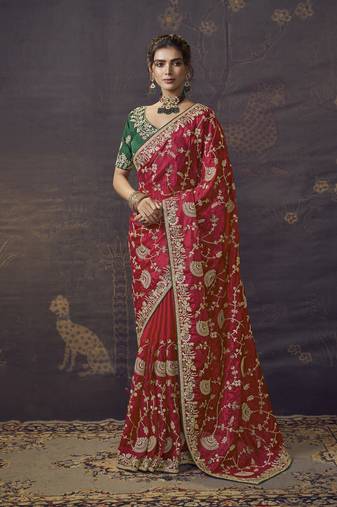 Rani party wear heavy organza saree with designer blouse fabric
