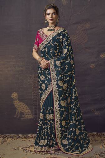 Dark green party wear heavy organza saree with designer blouse fabric