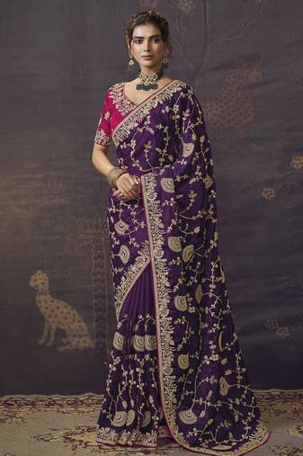 Purple party wear heavy organza saree with designer blouse fabric