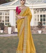 Yellow party wear jecquard saree with designer blouse fabric