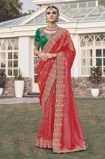Red party wear jecquard saree with designer blouse fabric