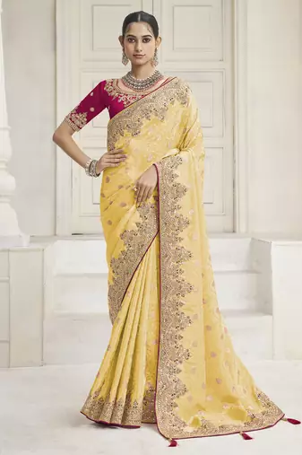 Yellow party wear tissue vicose saree with designer blouse fabric