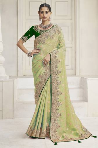 Pista green party wear tissue vicose saree with designer blouse fabric