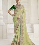 Pista green party wear tissue vicose saree with designer blouse fabric