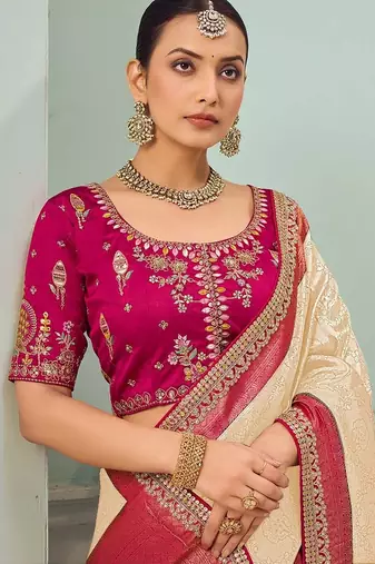 Cream party wear jecquard saree with designer blouse fabric