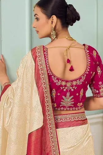 Cream party wear jecquard saree with designer blouse fabric
