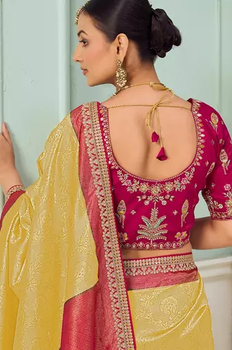 Yellow party wear jecquard saree with designer blouse fabric