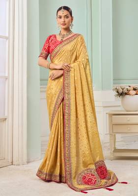 Yellow party wear tissue vicose saree with designer blouse fabric 1