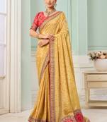 Yellow party wear tissue vicose saree with designer blouse fabric