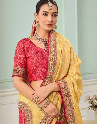 Yellow party wear tissue vicose saree with designer blouse fabric 2
