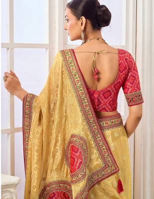 Yellow party wear tissue vicose saree with designer blouse fabric 3