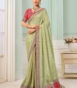Pista green party wear tissue vicose saree with designer blouse fabric
