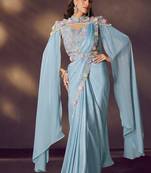 sky blue satin silk blend sequince embroidrey, stone & pearl handwork with designer blouse , cape, belt party wear saree