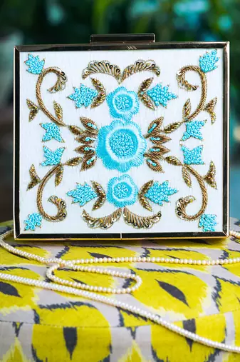 White floral embroidered clutch