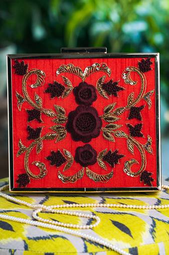 Red floral embroidered clutch