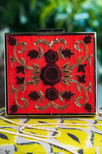 Red floral embroidered clutch