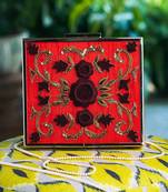 Red floral embroidered clutch