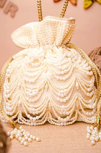 White pearl embroidered potli bag