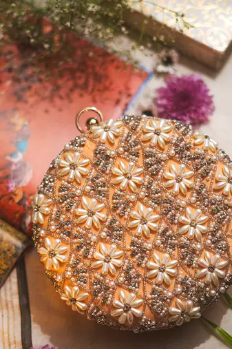 Peach floral embroidered clutch