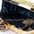 Gold embroidered clutch