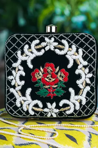Black floral embroidered clutch