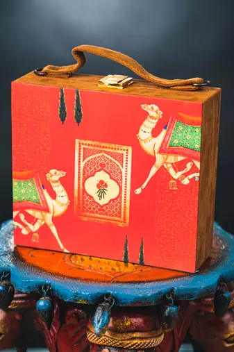 Red animal printed clutch