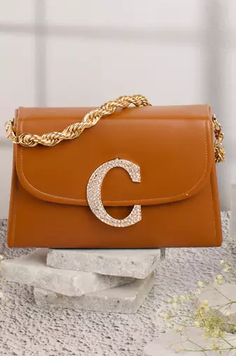 Tan customised 'c' leather clutch