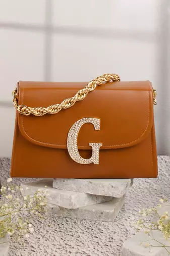 Tan customised 'g' leather clutch