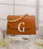 Tan customised 'g' leather clutch