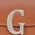 Tan customised 'g' leather clutch