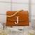 Tan customised 'j' leather clutch