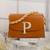 Tan customised 'p' leather clutch