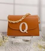 Tan customised 'q' leather clutch