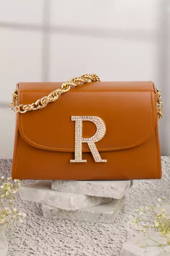 Tan customised 'r' leather clutch