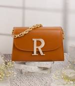 Tan customised 'r' leather clutch
