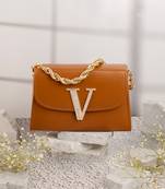 Tan customised 'v' leather clutch