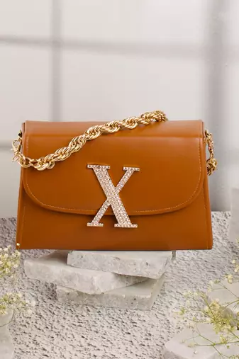 Tan customised 'x' leather clutch
