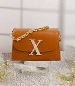 Tan customised 'x' leather clutch