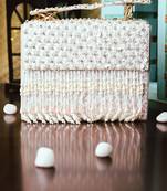 White embroidered clutch