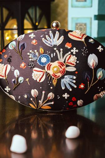 Black floral embroidered clutch