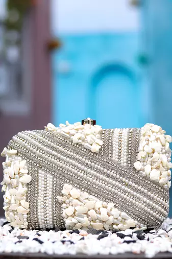 White beads embroidered clutch