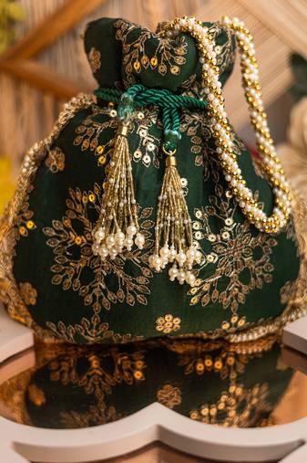 Green floral embroidered potli bag