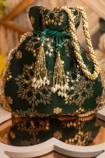 Green floral embroidered potli bag