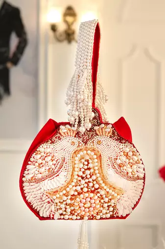 Maroon pearl embroidered potli bag